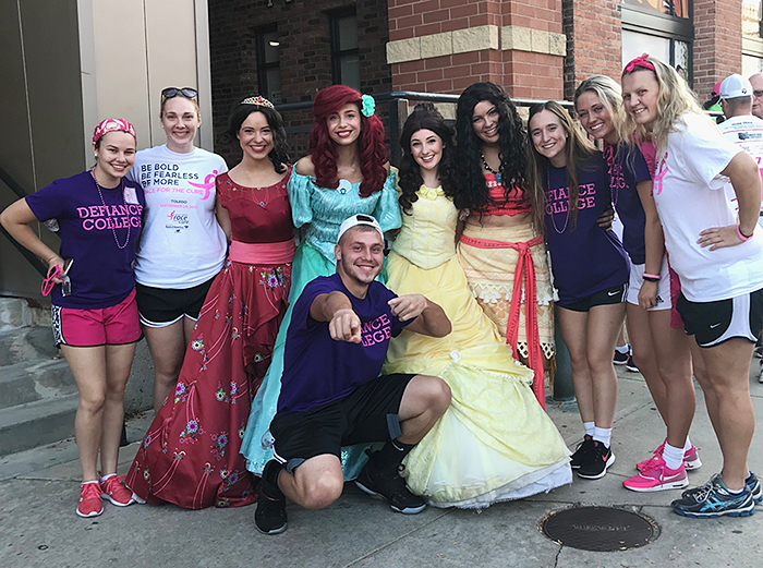 Service Leaders with costume Disney princesses
