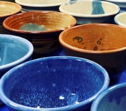 pottery lined up on table